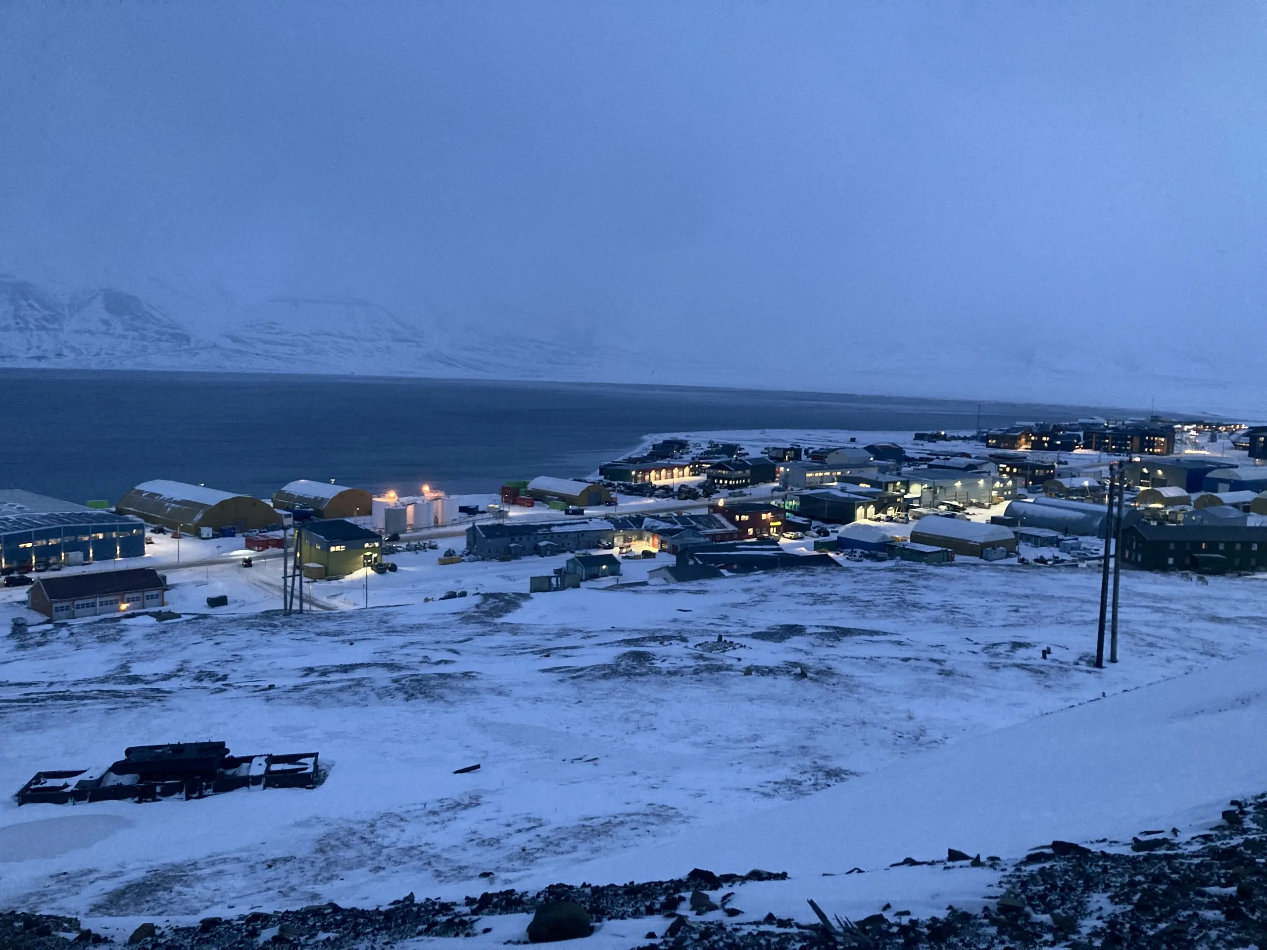 Longyearbyen and fjord panorama at blue hour in the light-winter season