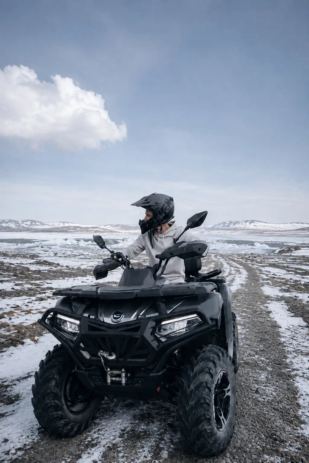 An ATV rider on the Svalbard tundra